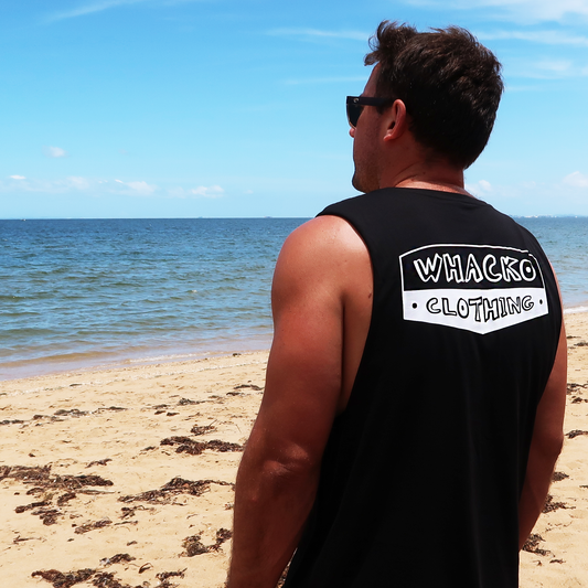 Black tank top, Whacko Clothing, Model rear view, beach